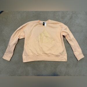 Adidas Peach Crewneck with Gold Logo and Side Slits